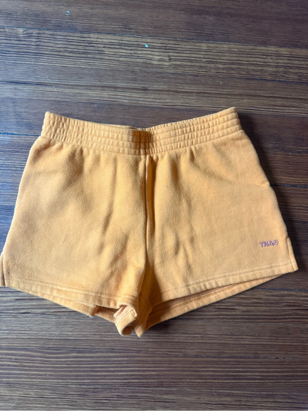 Aritzia TNA Sweatfleece Shorts in Orange